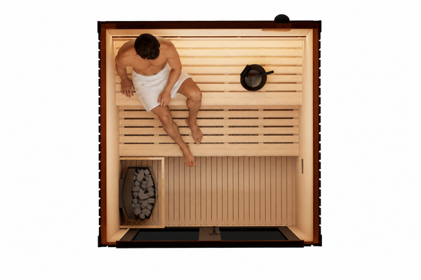 2–3 person outdoor traditional sauna overhead view with a man relaxing inside, featuring premium Canadian Hemlock interior, tinted glass, ambient LED lighting, and architectural aluminium exterior.