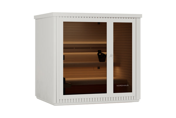 Nordhaus outdoor sauna cabinet in white with glass doors showing warm interior lighting and wooden sauna panels inside, isolated on a white background.