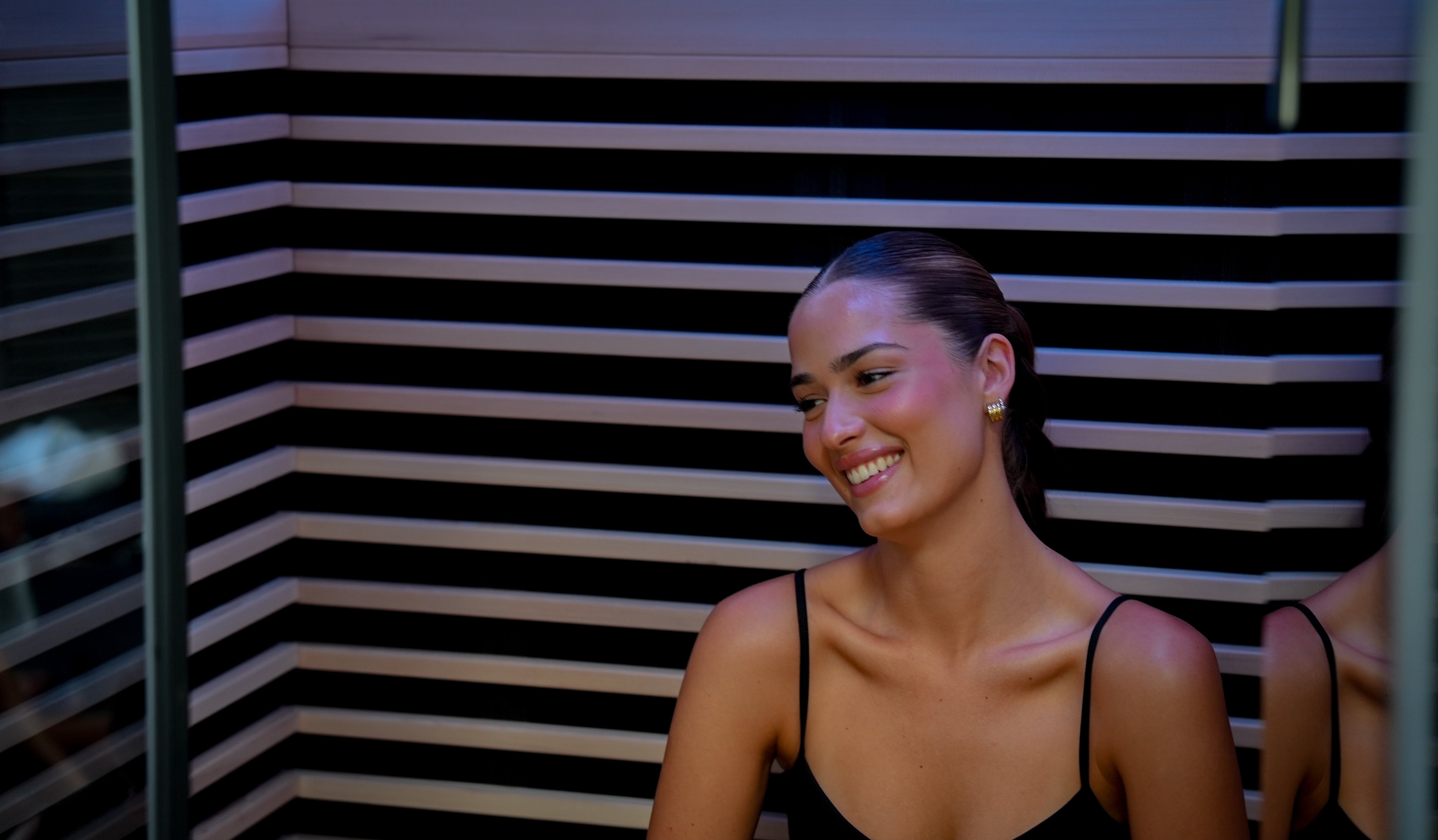 Nordhaus black infrared sauna interior with full spectrum heating and modern premium design